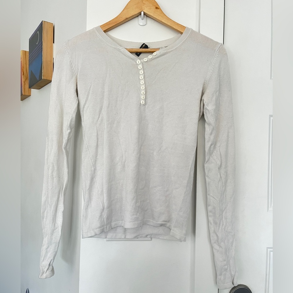 White long sleeve button-down sweater